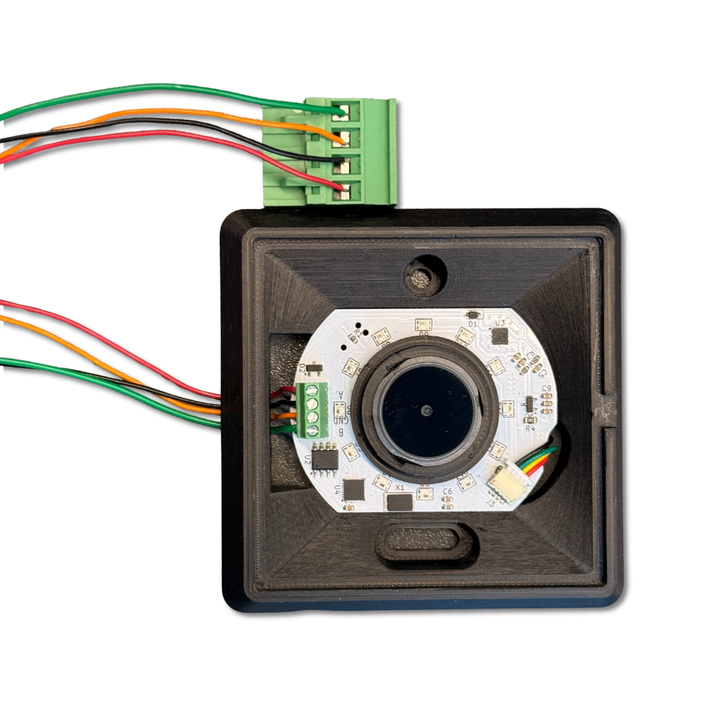 Gros plan sur le bornier CAMERA avec repères +5V, GND, RS485 A et RS485 B
